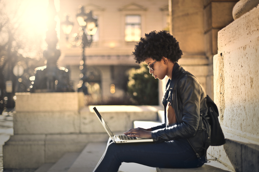 Student using her computer outside