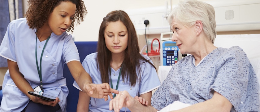 health psychologist meeting with patient and nurse