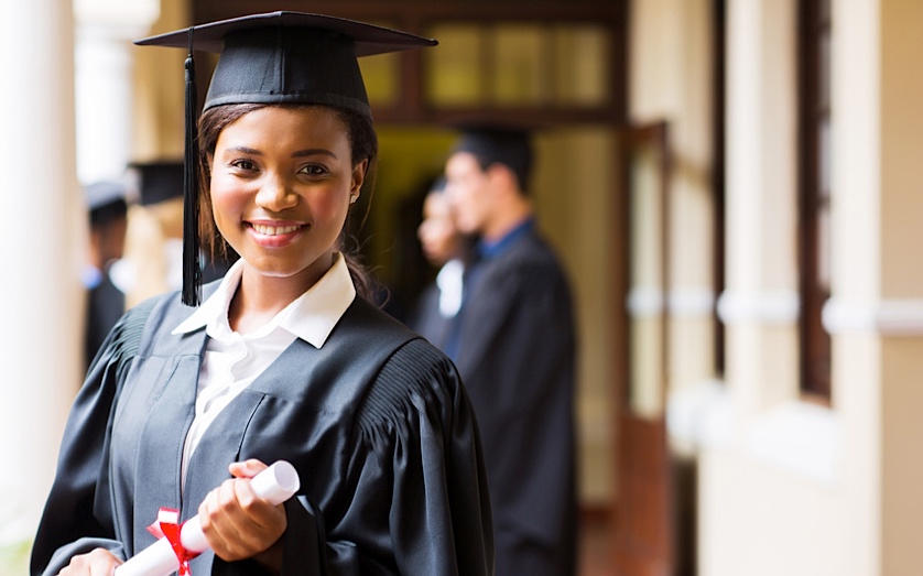 student graduating with a master's degree in psychology