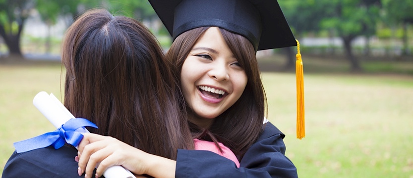 a happy college graduate