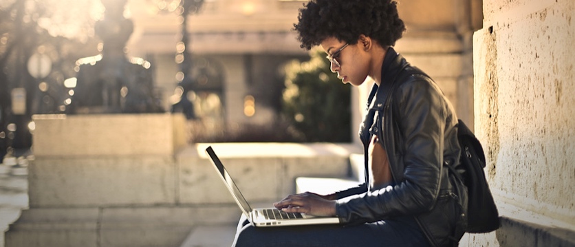 a student on her computer