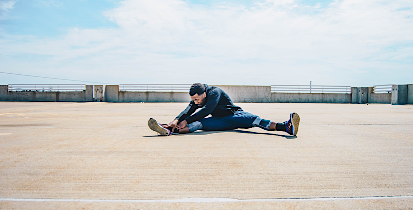 athlete stretching