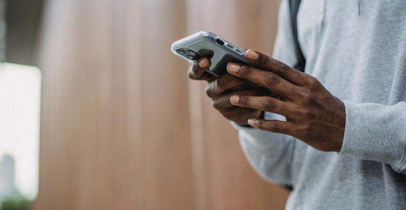 a college student on his phone