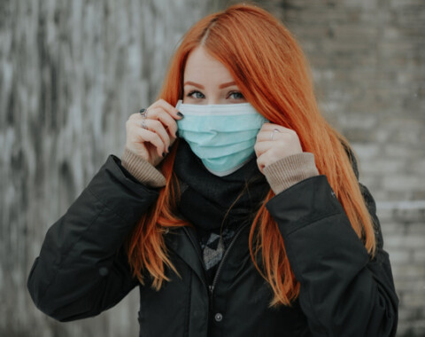 a college student wearing a mask