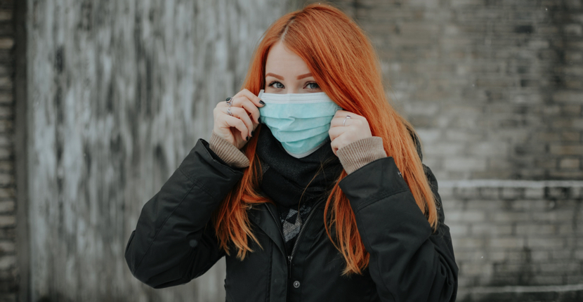 a college student wearing a mask